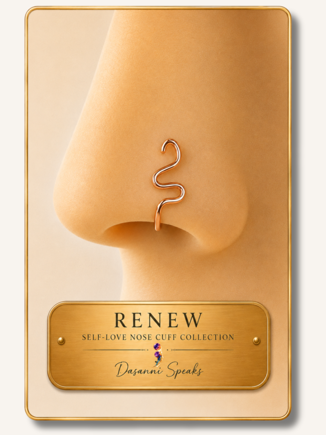 Close-up of the Renew handcrafted wire wrapped nose cuff in rose gold displayed on a model wearing a non-piercing nose cuff from the Dasanni Speaks Self-Love Collection.