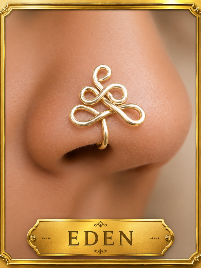 Close-up of the Eden handcrafted gold non-piercing nose cuff featuring an elegant intertwined wire design on the nose.